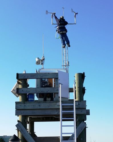 A CO-OPS Field Operations Division team member performs annual maintenance on a wind sensor in Mayport, FL (Station ID: 8720218).